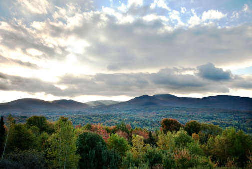 Quebec Monteregie landscape shot near Sutton soon after dawn. Features mountains, an inspiring sky and gorgeous fall colors.A selection of related photographs: