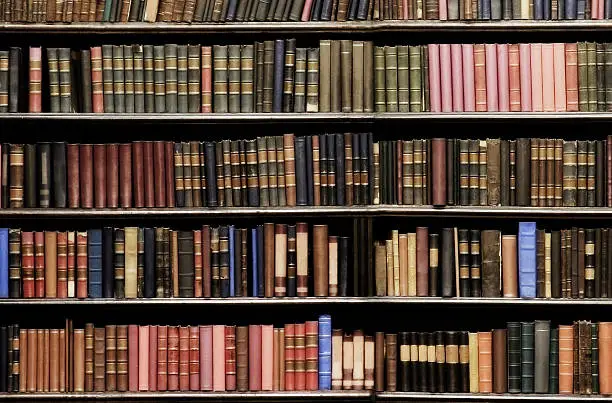 Photo of Old books in a library