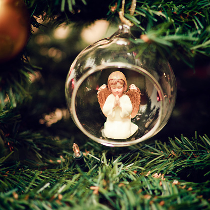 Christmas Bauble with Praying Angel inside.