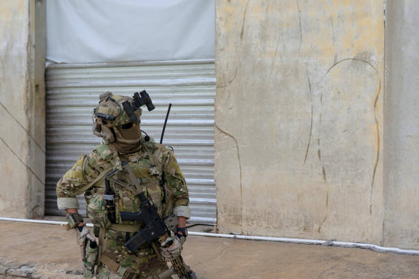 istock Soldier in civil war, ruined building. 1711514009