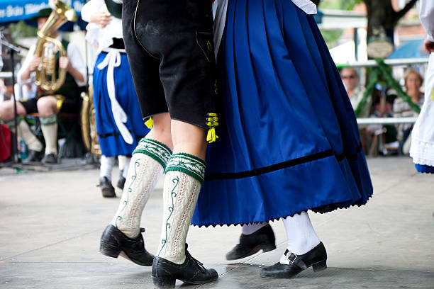 Bavarian couple in traditional outfits at Beer Fest dance stock photo