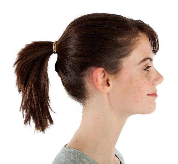 istock Smiling Teen In Profile With Brunette Ponytail On White 171152088