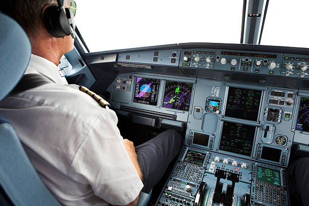 istock Senior pilot in the cockpit during a commercial flight 171152210
