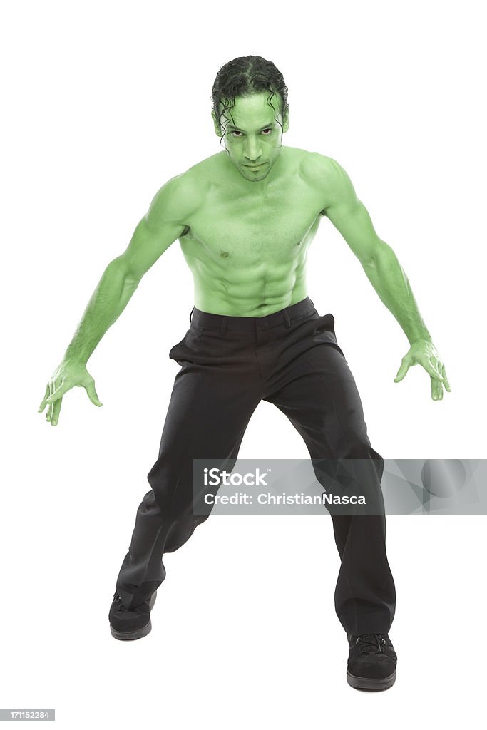 green monster Muscular built catcher with green skin in stance of attack. Looks like the comic action hero The Incredible Hulk.Please see some similar pictures from my portfolio: Cut Out Stock Photo