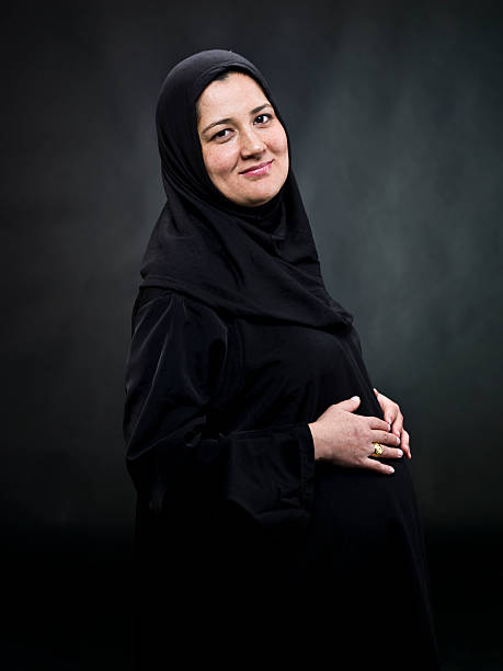 mujer embarazada musulmana - milfeh fotografías e imágenes de stock
