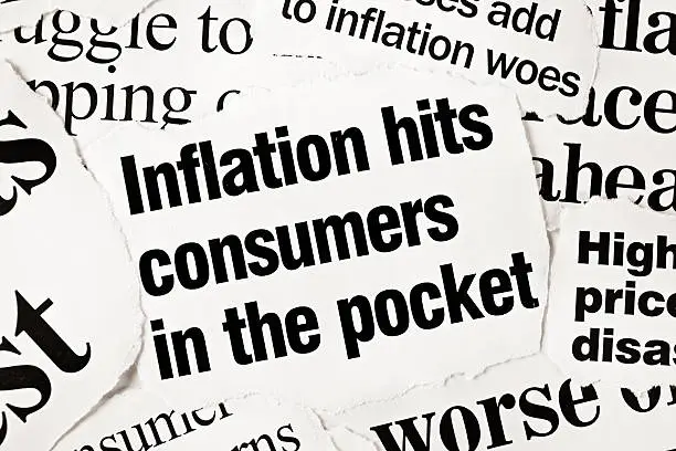 Photo of Newspaper headlines all concerned with inflation