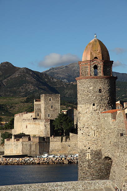 Collioure - the church bell tower of aglise Notre-Dame-des-Anges also a lighthouse and ChAteau Royal the royal castle of the Kings of Mallorca (1276 - 1344).