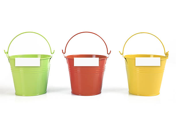 Three different colored buckets with handles stock photo