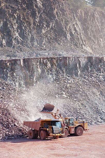 istock Open-pit Mine with Earth Mover and Dump Truck 171152803