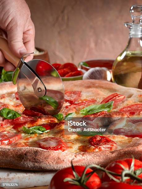 Pizza Stock Photo - Download Image Now - Cutting, Pizza, Baked