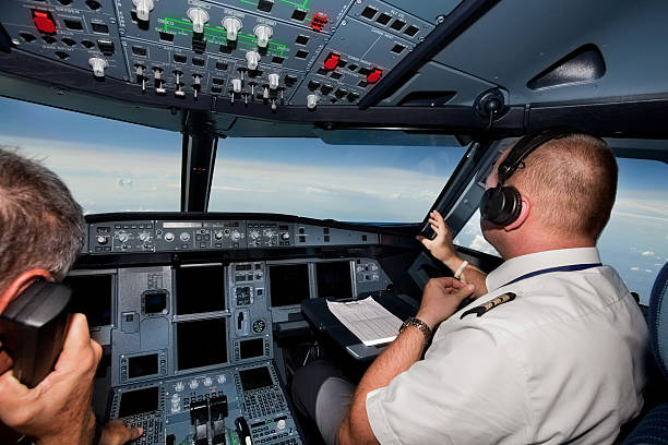 istock Pilots in the cockpit during a commercial flight 171153582