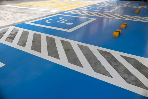 istock Reserved parking sign for handicapped. Disabled parking lot. 1711536093