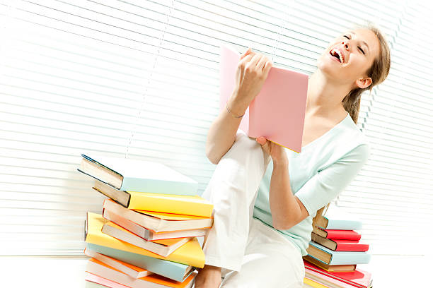 istock Young beautiful girl reads books 171153697