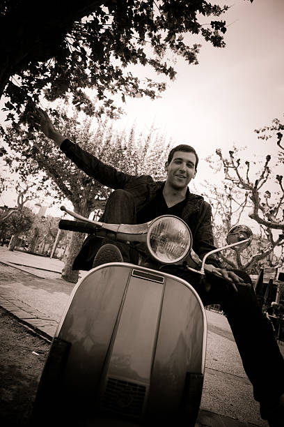 istock Italian Nostalgia: Man Riding an old style scooter 171153914