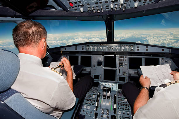 istock Pilots in the cockpit during a commercial flight 171153942