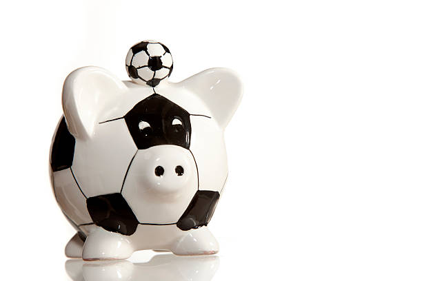 Soccer piggy bank stock photo