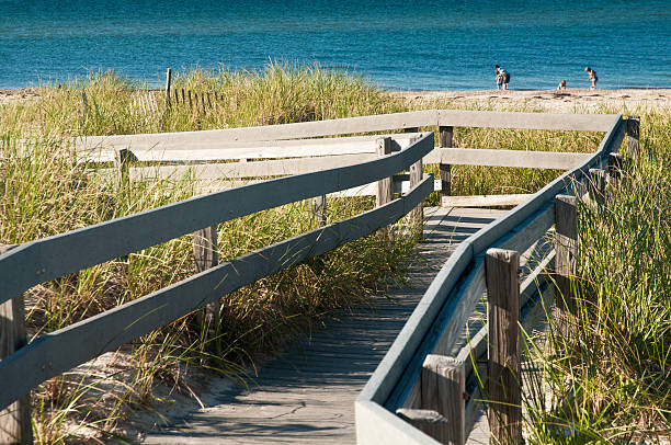 playa de arena del cuello - beach family boardwalk footpath fotografías e imágenes de stock