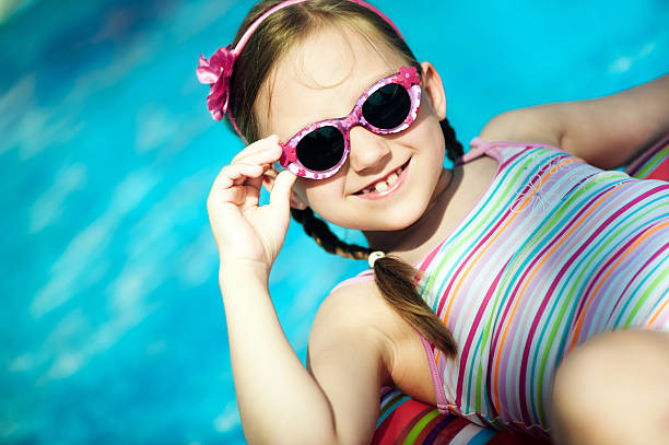 istock Little girl in the pool 171154170
