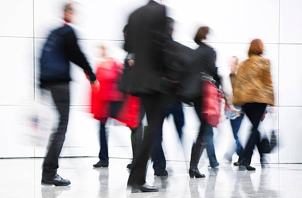 istock People Walking in White Interior Carrying Shopping Bags, Blurred Motion 171154564