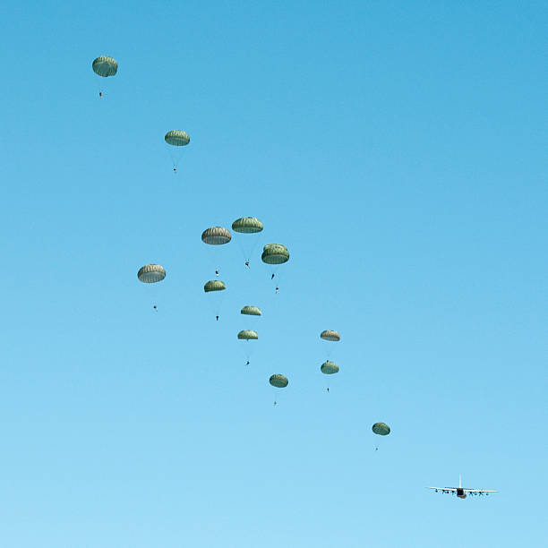 istock paratroopers jumping from C130 airplane 171154845