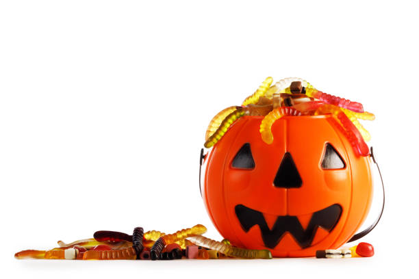 istock Worms candies in Halloween bag basket 1711549999