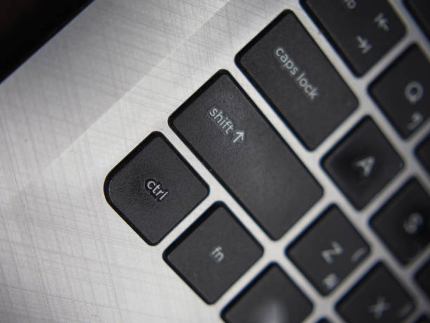 A laptop open against a white background