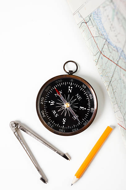 pianificazione percorsi l'esperto modo - direction drawing compass map work tool foto e immagini stock
