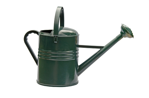 Red colored Watering Can Tilted Slightly and isolated withclipping path.