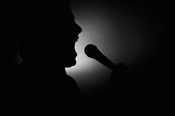 Silhouette of a Man Singing