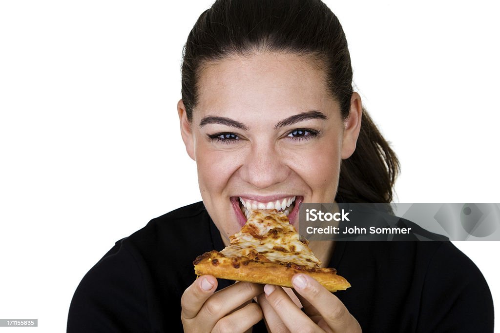 Urocza dziewczynka jedzenie pizzy - Zbiór zdjęć royalty-free (Gryźć)