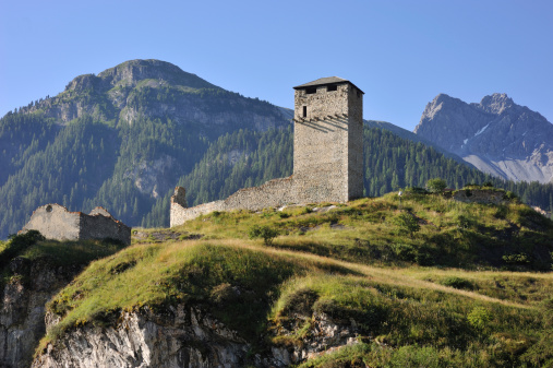 Castle Steinsberg Ruins on rocky hill, Scuol, Switzerland
