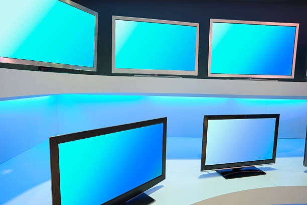 istock Rows of LCD TVs in TV Store 171156472