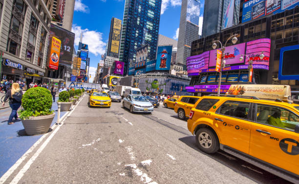 Free Stock Photo of Yellow taxis line busy New York City street ...
