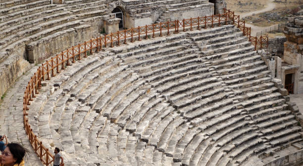 istock Ancient theater sitting area standing in perspective 1711568737