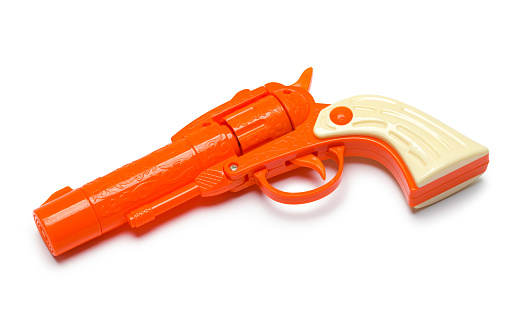 Orange Toy Pistol Cut Out on White.