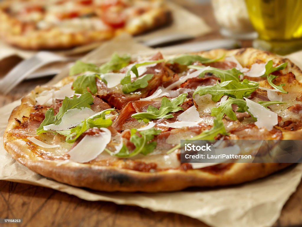 Pizza al Prosciutto - Photo de Pizza libre de droits