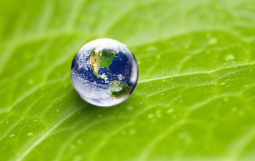 Ecology - Enviornmental conservation concept: World globe as waterdrop with