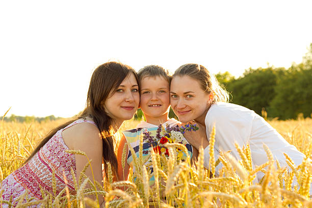 istock Happy family in wheat field 171159177
