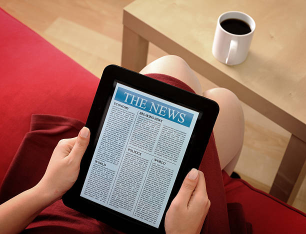 istock Reading news with digital tablet 171159267