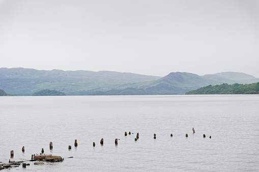 Peaceful calm water during summer at Loch Lomond UK