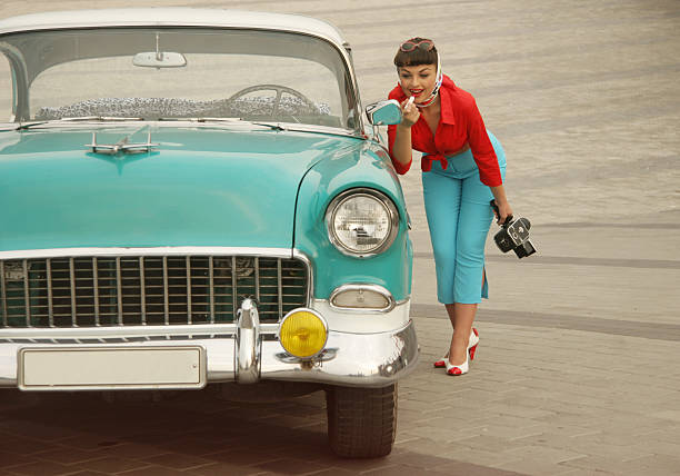 Beautiful Pin-Up Girl Near The Vintage Car Emulations of vintage style photography.See full Lightbox pin up girls and cars stock pictures, royalty-free photos & images