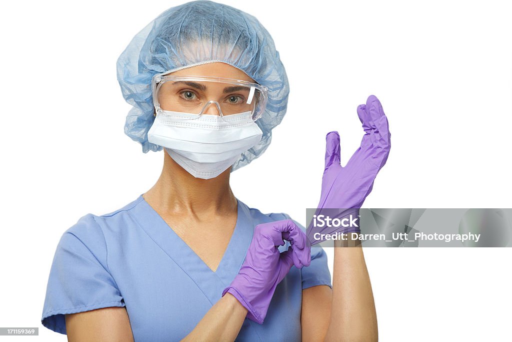 Krankenschwester in schützende Bekleidung Blick in die Kamera - Lizenzfrei Krankenpflegepersonal Stock-Foto