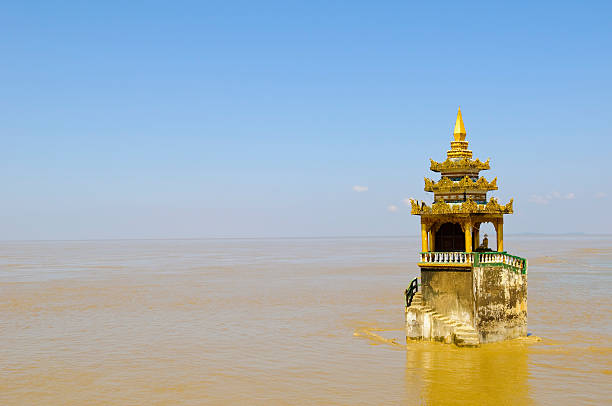 A small shrine, surrounded by the sea, which belongs to the Yele Paya in Kyaikkami, Myanmar