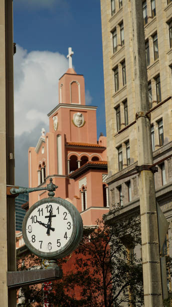 istock Time and Faith: Miami's Street Clock and Church 1711626645