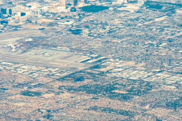 Aerial view of Los Vegas, Nevada, USA and Harry Reid International Airport LAS or McCarran Field and other nearby areas.