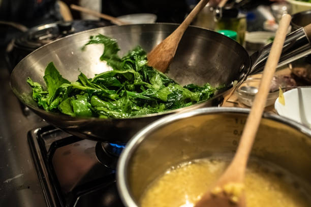 istock Cook sauteed kale vegetables in a wok 1711664844