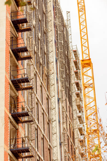 istock Metal scaffolding in a skyscraper under construction. 1711667579