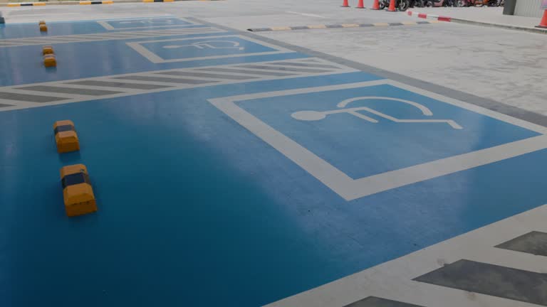 Reserved parking sign for handicapped. Disabled parking lot.