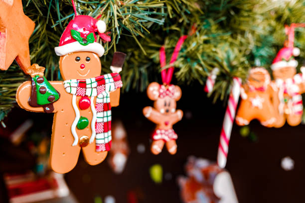 istock Dolls to decorate at Christmas hanging from the childlike tree. 1711684875