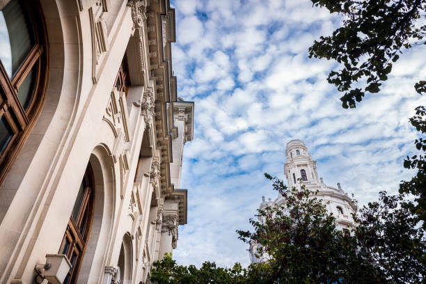 istock Facade of large institutional building with large columns and windows, background sky, low angle shot, in Valencia. 1711686560